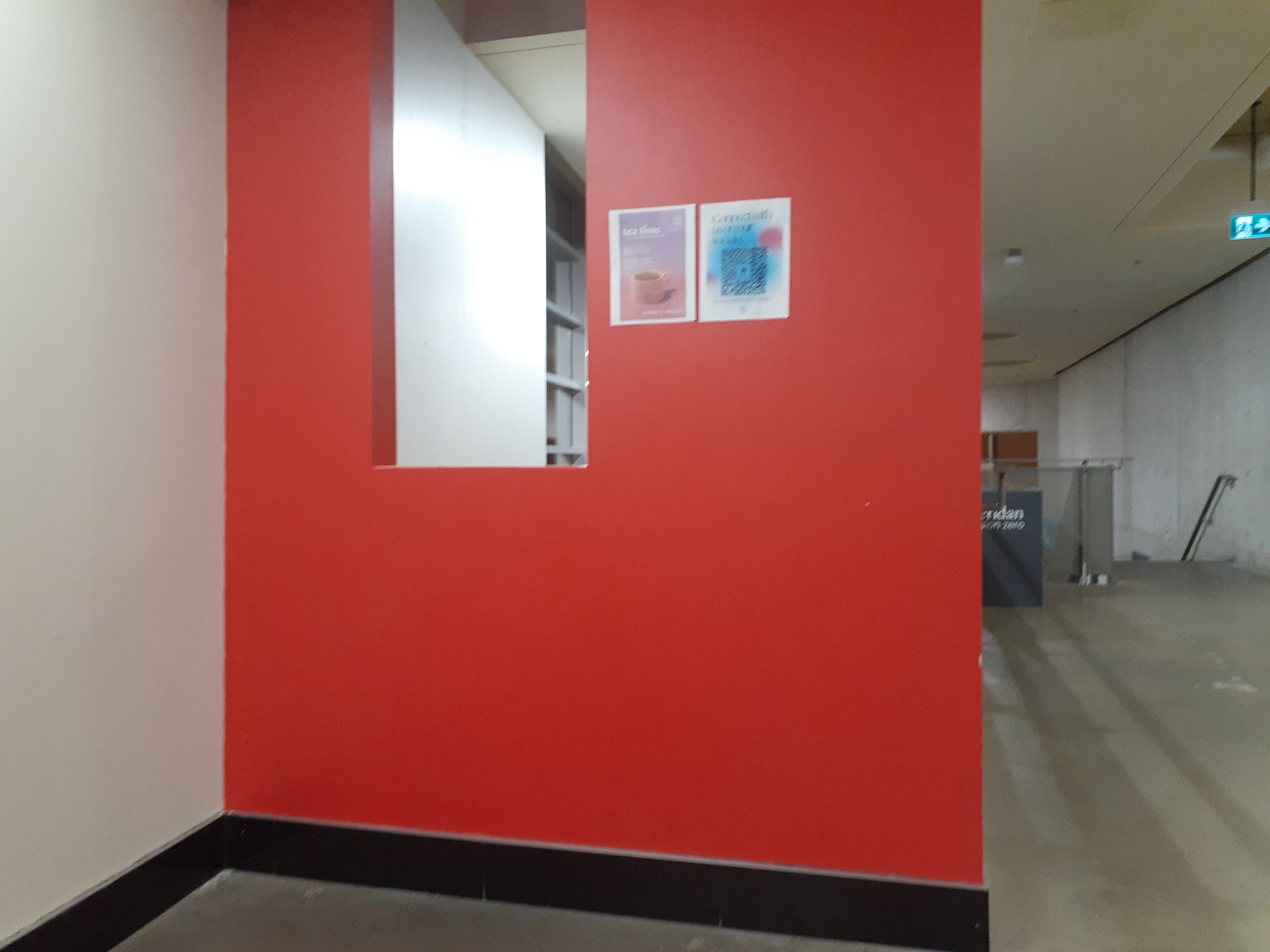 the opposite side of the mural wall